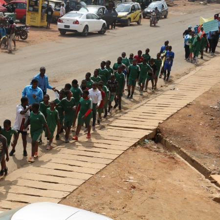 Staff and students Pose for a shot after walk through Finance Junction to sensitize the Population about World Obesity Day